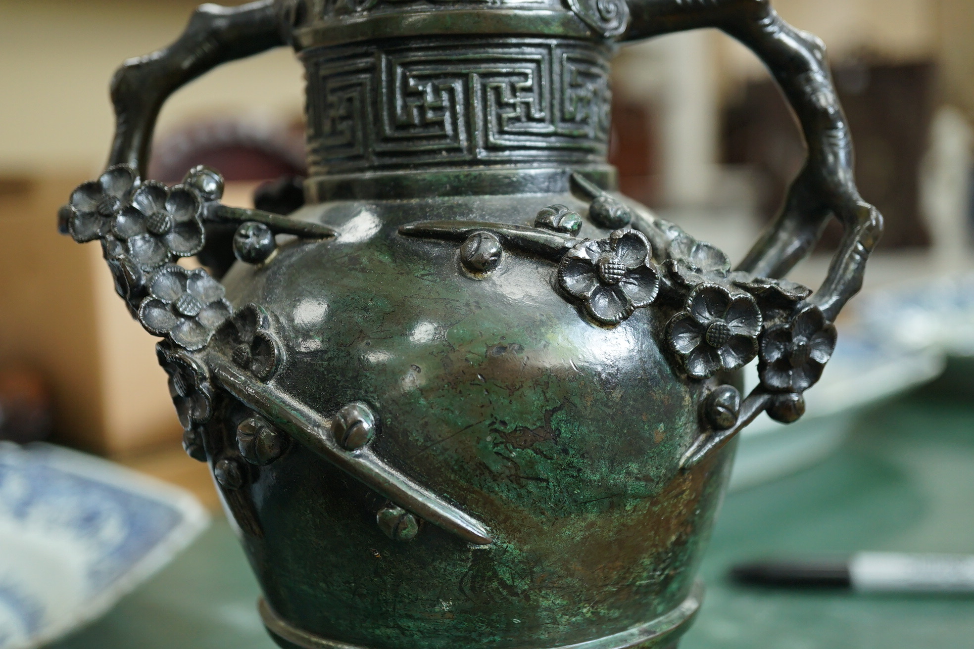 A pair of Chinese bronze gu-shaped vases, Qing dynasty